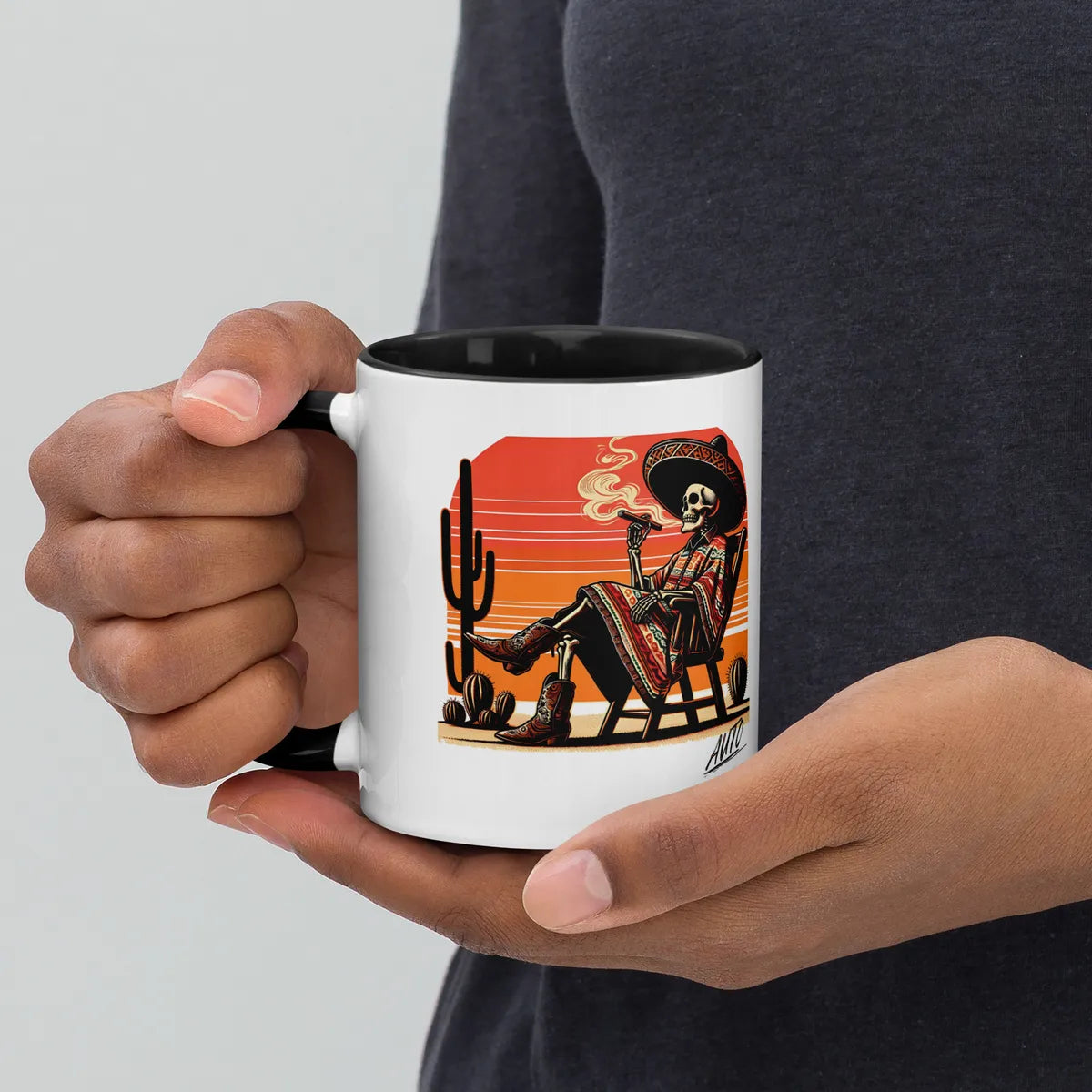 EL SOL Mug black interior, held in hand front view
