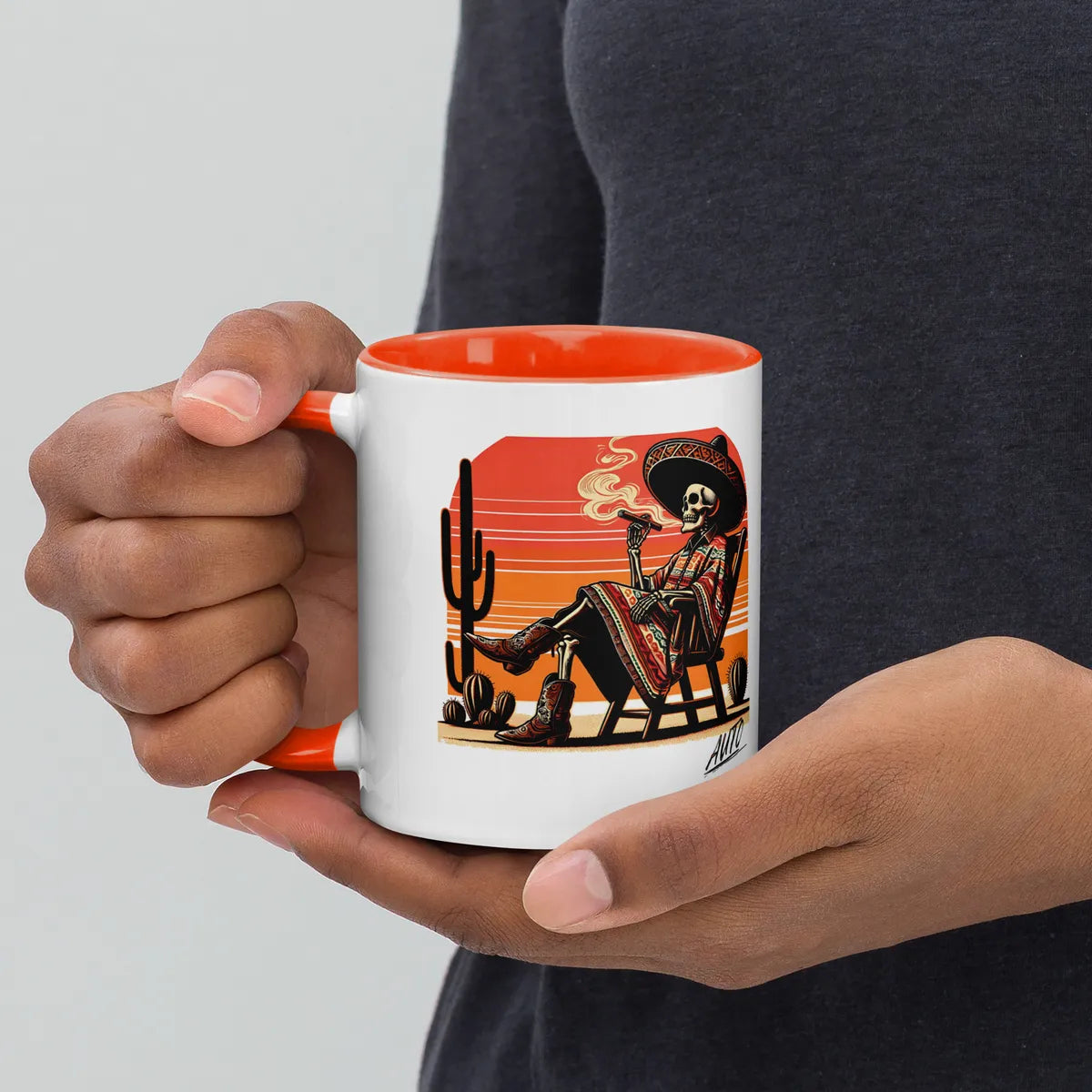 EL SOL Mug white and orange, held in hand side view
